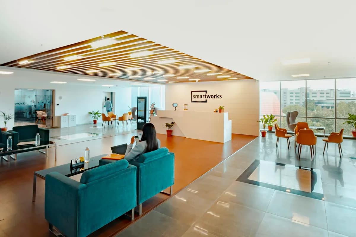 BizzFly engineers and consultants at work in a modern open-plan technology office in India