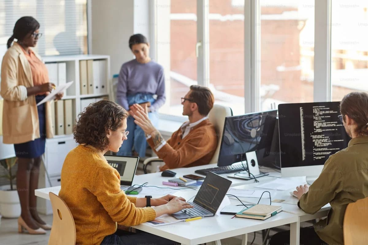 Systems analyst writing detailed functional specifications, acceptance criteria, and edge case rules