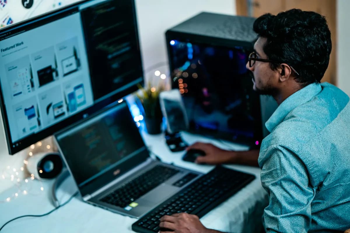 Professional Indian software engineer architecting enterprise systems at modern workstation