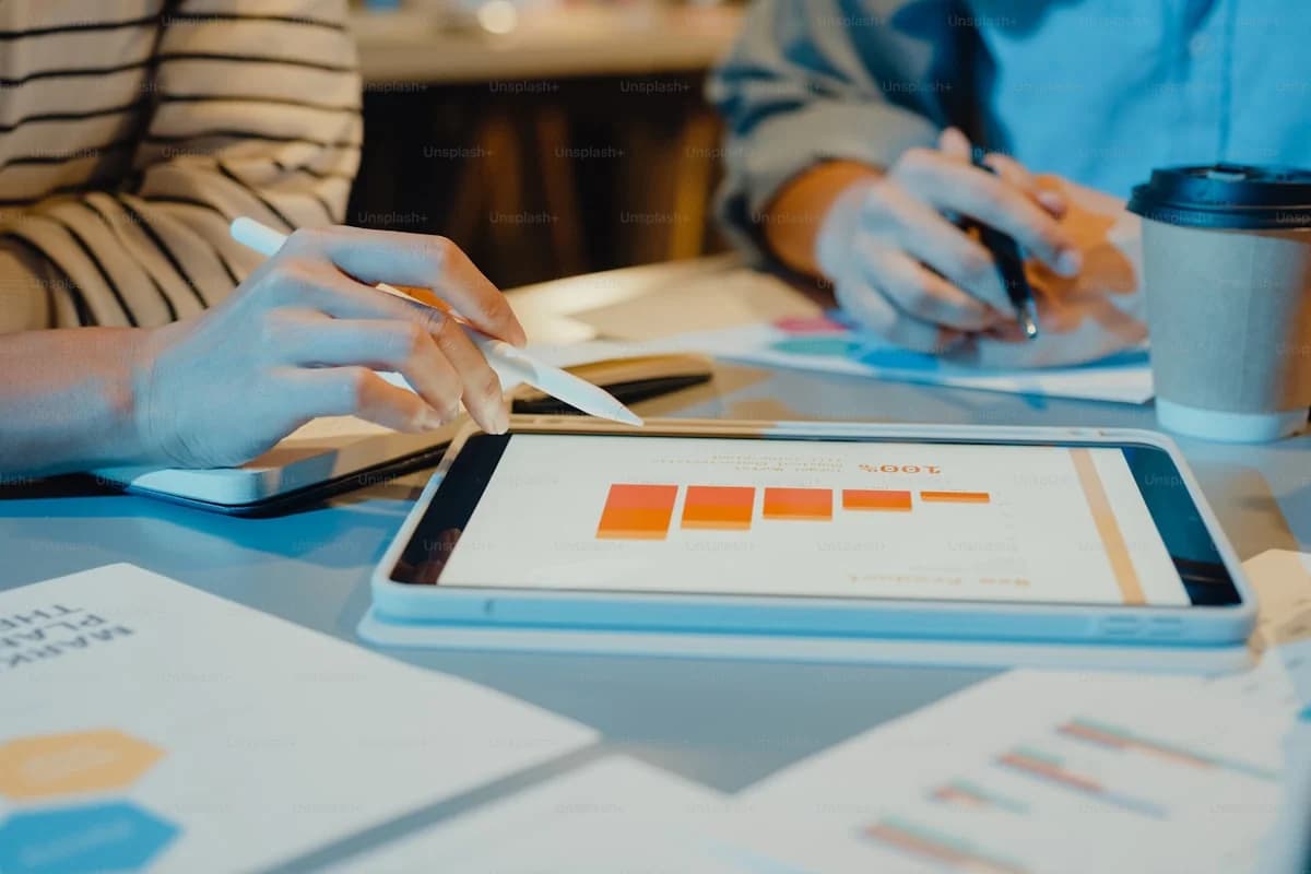 Business leadership team evaluating digital transformation priorities in conference room