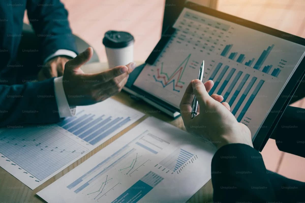 Operations directors calculating labor hour savings and return on investment for workflow automation proposals